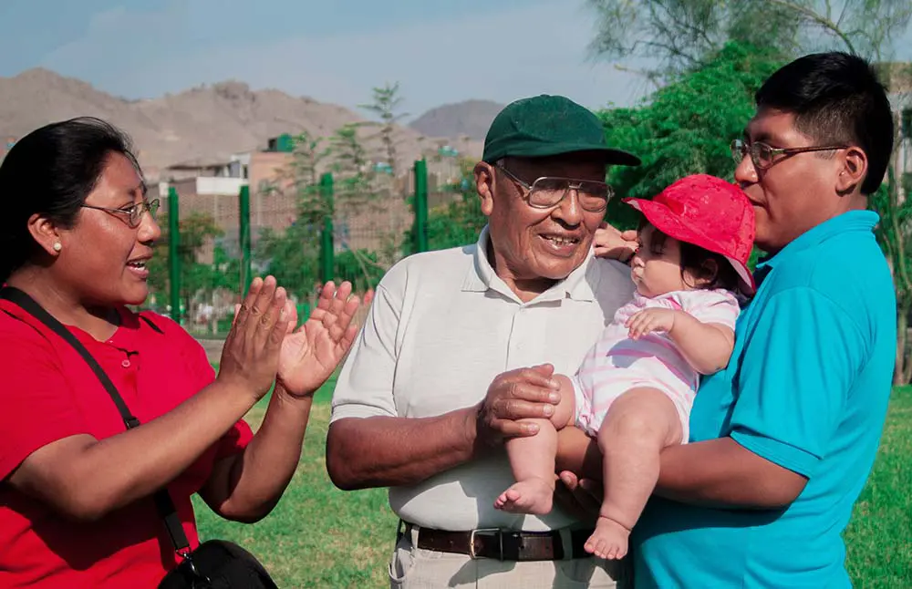 Multi-generational Indigenous family having fun on a walk